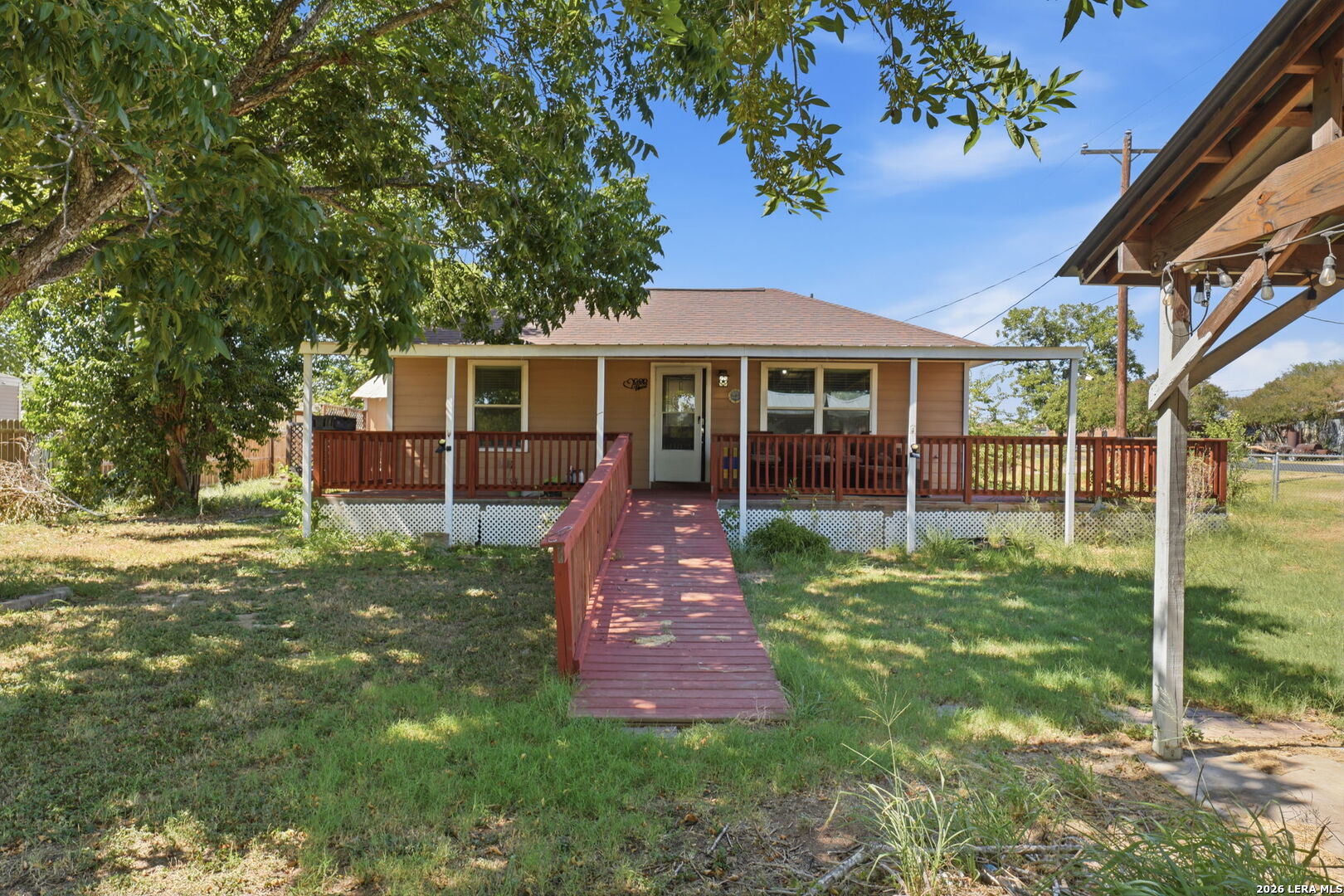 251 AVENUE J, Poteet, TX 78065 — photo 1