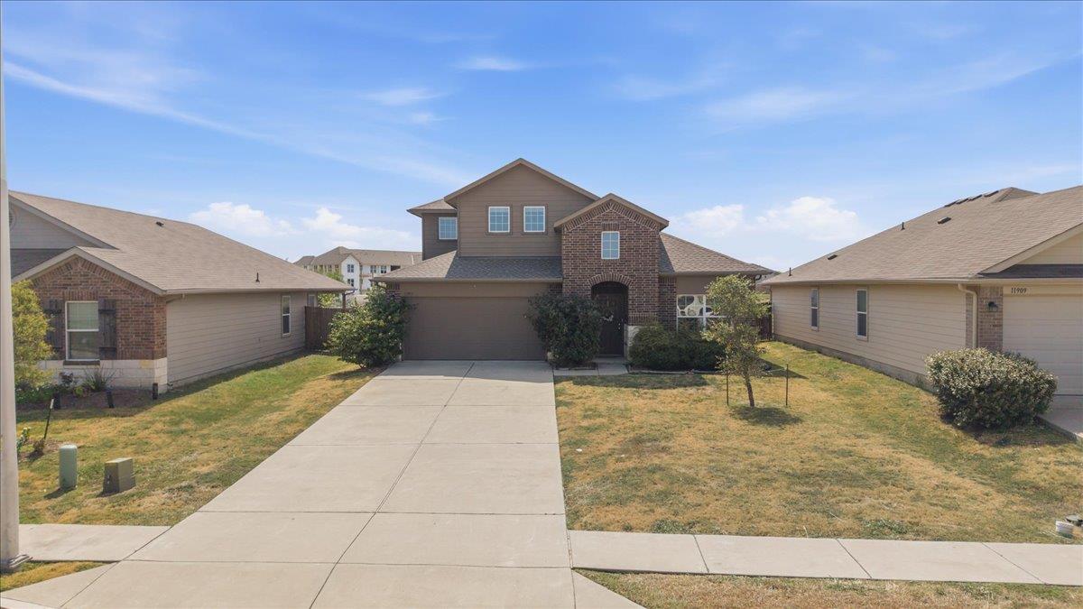 11913  Riparian Rd, Manor, TX 78653 — photo 1