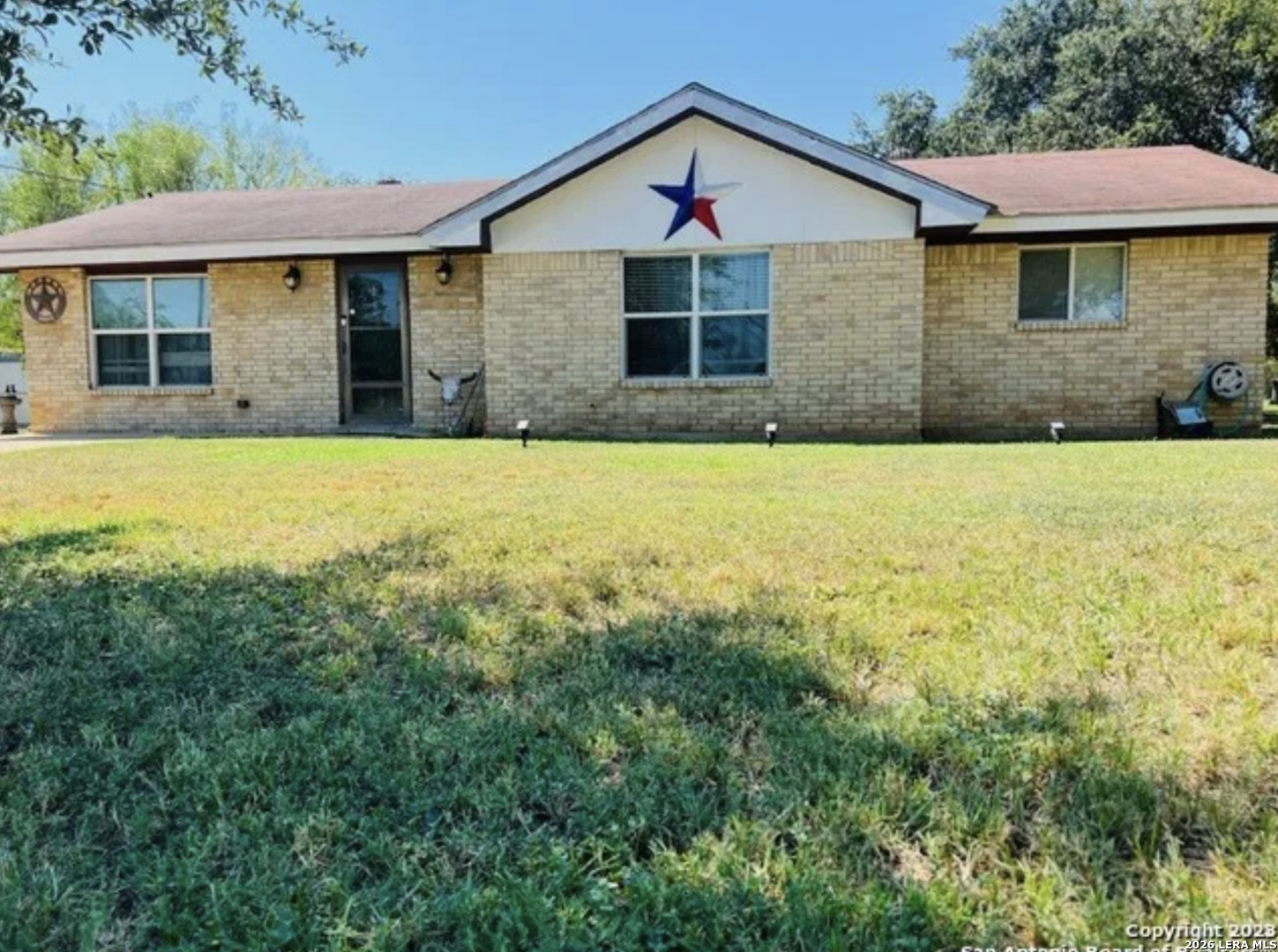305 E HUGO ST, Dilley, TX 78017 — photo 1