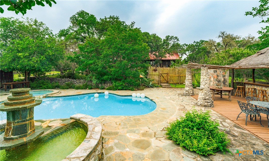 1218 Oakwood Loop, Wimberley, TX 78676 — photo 1
