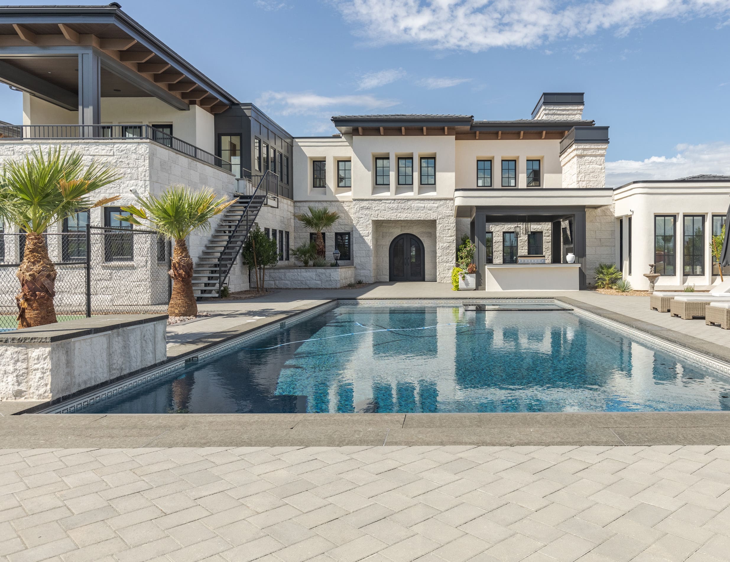 Luxury home with pool marketed by ERA Brokers Consolidated