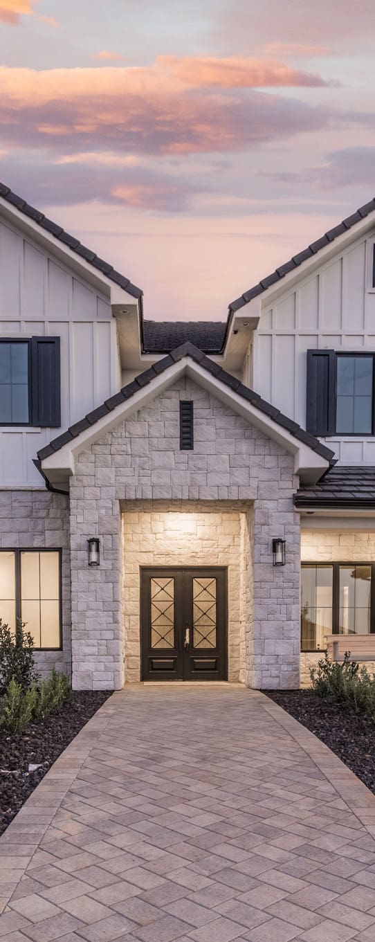Contemporary home exterior photographed at dusk